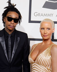 Rapper Wiz Khalifa and wife, Amber Rose, arrive at the 56th annual Grammy Awards in Los Angeles, California