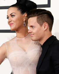 Singer Katy Perry and her brother David Hudson arrive at the 56th annual Grammy Awards in Los Angeles, California