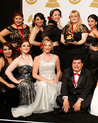 Mariachi Divas De Cindy Shea pose backstage with their award for best regional Mexican music album (including Tejano) for 'A Mi Manera' at the 56th annual Grammy Awards in Los Angeles, California