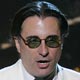 Actor Andy Garcia accepts the award for the best traditional tropical album for musician Israel Lopez during the pre show telecast at the 47th annual Grammy Awards.