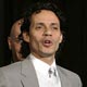 Marc Anthony holds his award for best latin pop album for 'Amar Sin Mentiras' (to love without lies) at the 47th annual Grammy Awards at the Staples Center in Los Angeles.