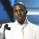 Rapper Kayne West accepts the award for best rap album during the 47th annual Grammy Awards in Los Angeles.