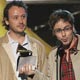 Members of Basement Jaxx accept their award for Best Electronic Dance Album at the 47the annual Grammy Awards in Los Angeles.