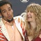 Ben Harper with actress Laura Dern backstage while holding his awards for Best Pop Instrumental Performance and Traditional Soul Gospel Album for his album.