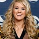 Carrie Underwood holds her Grammys for Best Female Country Vocal Performance