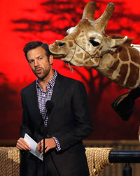 Actor Jason Sudeikis speaks next to a baby giraffe at the seventh annual Spike TV's 'Guys Choice' awards in Culver City, California