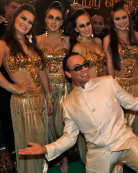 Actor Jean-Claude Van Damme poses on the green carpet before the 14th annual International Indian Film Academy (IIFA) awards show in Macau