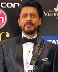 Shah Rukh Khan poses on the green carpet before the 14th annual International Indian Film Academy (IIFA) awards show in Macau