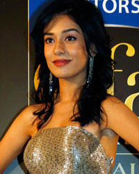 Amrita Rao poses on the green carpet before the 14th annual International Indian Film Academy (IIFA) awards show in Macau