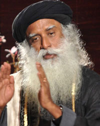 Spiritualist Sadhguru Jaggi Vasudev of the Isha Foundation speaks during the discussion on 'In Conversation with the Mystic' with Songwriter Prasoon Joshi