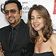 Gulshan Grover, star of the film I Am Kalam poses at the opening night gala of the Indian Film Festival with festival executive director Christina Marouda in Hollywood