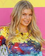 Singer Fergie, pregnant, arrives at the 2013 Kids Choice Awards in Los Angeles, California