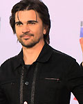 Juanes of Colombia arrives with his wife Karen Martinez during the 13th Latin Grammy Awards in Las Vegas