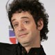 Cerati poses with his two Latin Grammy Awards