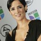 Mexican singer-songwriter Julieta Venegas poses with award