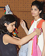 A model display the fittings of designer Aki Narula