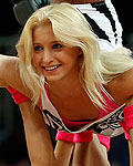 Members of the dance group 'Red Foxes' perform during the game between Great Britain and Spain at their men's preliminary round Group B basketball match