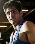 Vijender leaves the ring after winning in his fight with Gausha of the U.S. in their Men's Middle (75kg) Round of 16 boxing match during the London 2012 Olympic Games