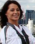 Nadia Comaneci and John Amaechi atop North Greenwich Arena on Day 64 of the London 2012 Torch Relay