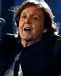 Former Beatle Paul McCartney sings during the opening ceremony of the London 2012 Olympic Games