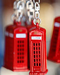 Traditional red telephone box keyrings are displayed in a kiosk in London ahead of the London 2012 Olympic Games