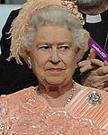 As if by magic, the Queen appeared in the stands at the stadium - part of a crowd of about 80,000 - amid cheer