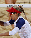 Jennifer Kessy and April Ross of the U.S. celebrate a point against Argentina's Ana Gallay and Maria Virginia Zonta at the London 2012 Olympics Games