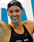 Dana Vollmer of the U.S. reacts after she set a world record and won the women's 100m butterfly final during the London 2012 Olympic Games