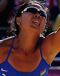 Mauritius' Nioun Chin Elodie Li Yuk Lo returns the ball during their women's preliminary round beach volleyball match against the Czech Republic at the London 2012 Olympic Games