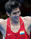 India's Vijender reacts after defeating Kazakhstan's Suzhanov in the Men's Middle (75kg) Round of 32 boxing match during the London 2012 Olympic Games