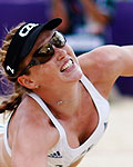 Czech Republic's Marketa Slukova and Kristyna Kolocova defend during the women's beach volleyball preliminary match against Austria's Stefanie Schwaiger and Doris Schwaiger at the Horse Guards Parade during the London 2012 Olympic Games