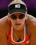 Marleen van Iersel of the Netherlands waits for a shot during their women's beach volleyball preliminary round match against Spain at the London 2012 Olympics Games at the Horses Guards Parade