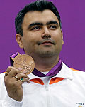 India's Gagan Narang poses with his bronze medal during the 10m air rifle men's victory ceremony at the Royal Artillery Barracks during the London 2012 Olympic Games