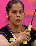 India's Saina Nehwal plays against Belgium's Lianne Tan during their women's singles group play stage Group E badminton match during the London 2012 Olympic Games at the Wembley Arena