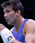 India's Manoj Kumar reacts after he defeated Turkmenistan's Hudayberdiyev in the Men's Light Welter (64kg) Round of 32 boxing match during the London 2012 Olympic Games