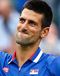 Serbia's Djokovic celebrates after winning his men's singles tennis match against Roddick of the U.S. at the All England Lawn Tennis Club during the London 2012 Olympic Games