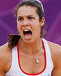 Spain's Liliana Fernandez Steiner and Elsa Baquerizo McMillan celebrate a point against Argentina during their women's preliminary round beach volleyball match at the London 2012 Olympic Games at Horse Guards Parade