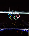 A view of the Tower Bridge is seen as it is lit up to celebrate the Olympics in London