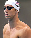 Michael Phelps of the U.S. prepares to swim in his men's 200m butterfly heat at the London 2012 Olympic Games