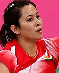 Jwala Gutta and Ashwini Ponnappa play against Singapore during their women's doubles badminton match during the London 2012 Olympic Games at the Wembley Arena