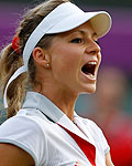 Russia's Maria Kirilenko celebrates after winning the first set in her women's singles tennis match against Britain's Watson at the All England Lawn Tennis Club during the London 2012 Olympic Games