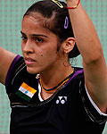 India's Saina Nehwal celebrates winning against Denmark's Tine Baun during their womens singles badminton quarterfinals match