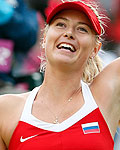 Russia's Sharapova celebrates after defeating Belgium's Clijsters in their women's singles quarterfinals tennis match