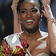 Miss Angola Leila Lopes is crowned by Miss Universe 2010 Ximena Navarrete of Mexico after being named Miss Universe 2011 in Sao Paulo