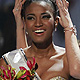 Miss Angola Leila Lopes is crowned by Miss Universe 2010 Ximena Navarrete of Mexico after being named Miss Universe 2011 in Sao Paulo