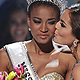 Miss Angola Leila Lopes is kissed by Miss Universe 2010 Ximena Navarrete of Mexico after being named Miss Universe 2011 in Sao Paulo