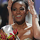 Miss Angola Leila Lopes is crowned by Miss Universe 2010 Ximena Navarrete of Mexico after being named Miss Universe 2011 in Sao Paulo