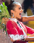 Miss USA Olivia Culpo is congratulated by Miss Teen USA West and Miss Universe 2011 Lopes during Miss Universe pageant in Las Vegas