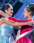 Miss USA Olivia Culpo (R) reacts with Miss Philippines Janine Tugonon after winning the Miss Universe pageant