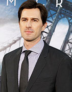 Director Joseph Kosinski poses at the premiere of his new film 'Oblivion' in Hollywood, California